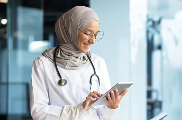 Wound care nurse with notepad